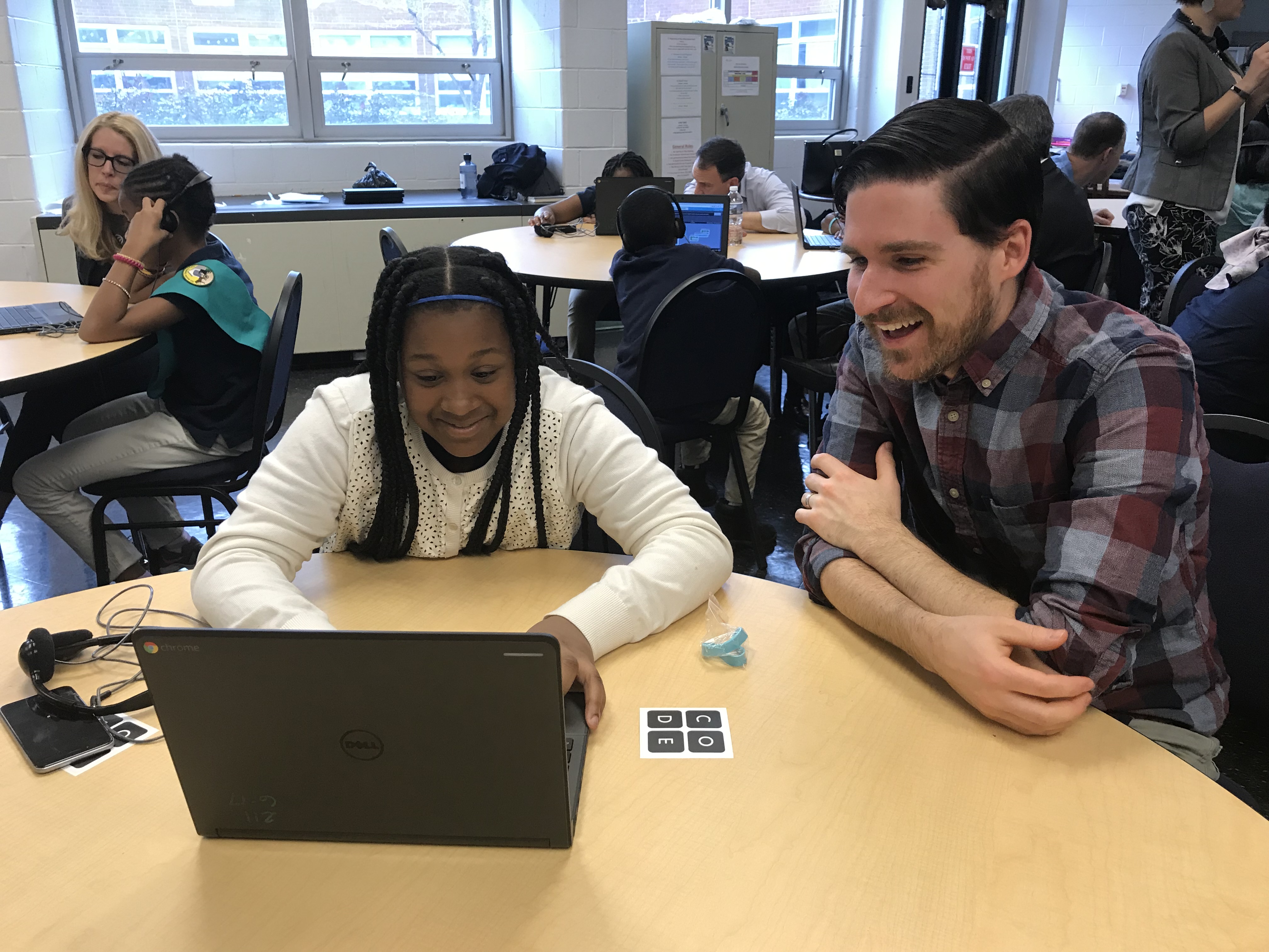 Senior UI Developer Brendan McKeown and a student at Dr. Ethel Allen School explore callback functions