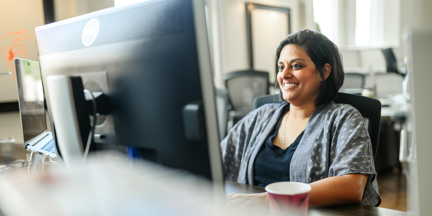 person sitting at a computer working