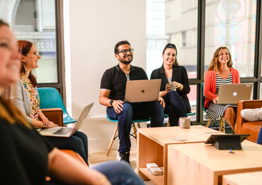 People sitting in a conference room collaborating