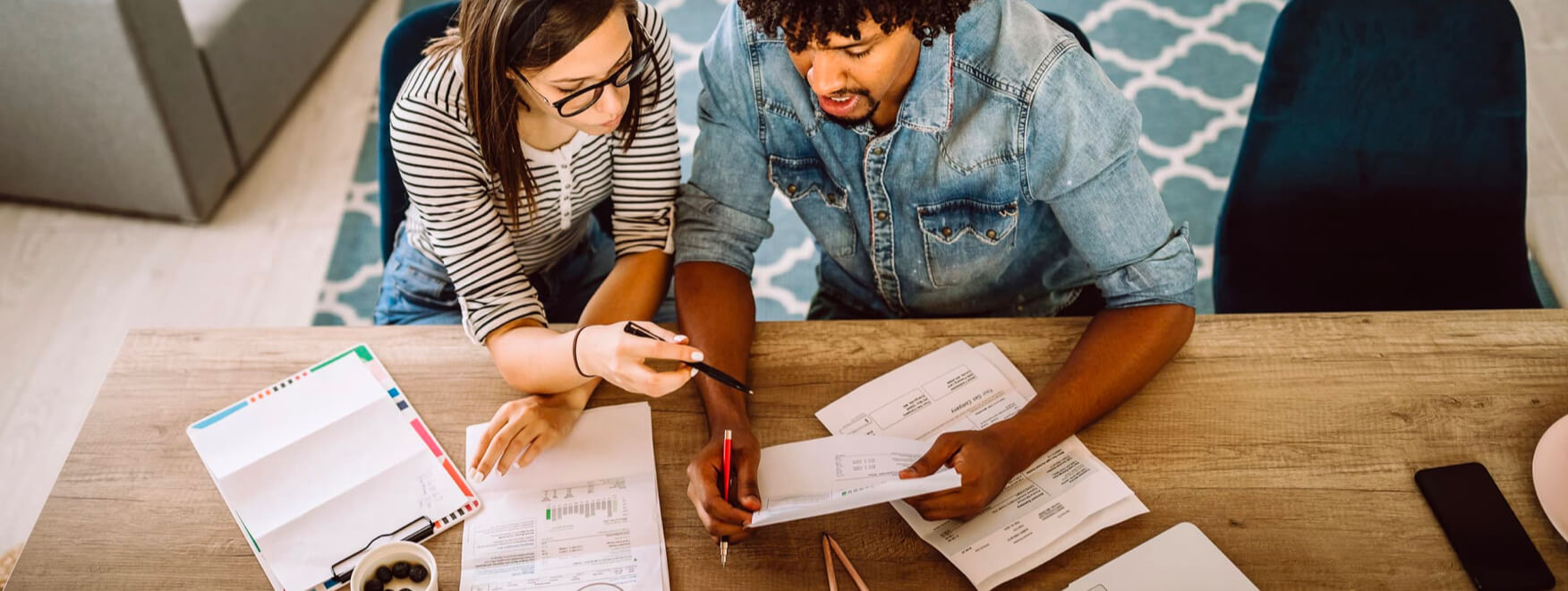 people working at a desk together