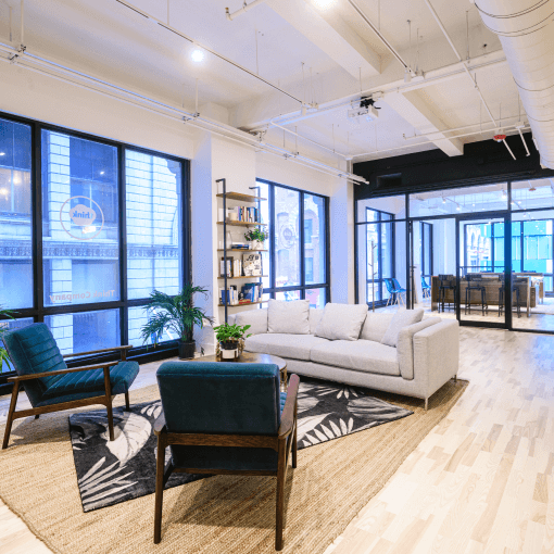 philadelphia studio chairs and couches in front of large windows