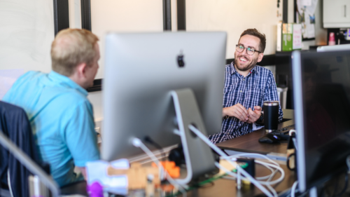 Developers working at a computer